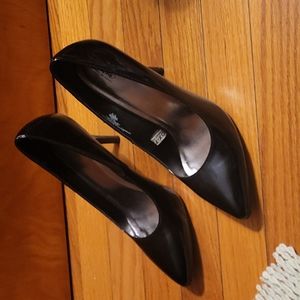 Black patent leather pumps